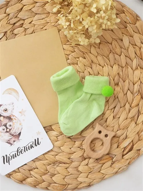 Носочки для новорождённых с бубоном Light Green Носочки для новорождённых с бубоном Light Green